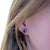 A timeless classic for any jewelry collection, this elegant pair of oval-shaped stud earrings is crafted in solid 18k...