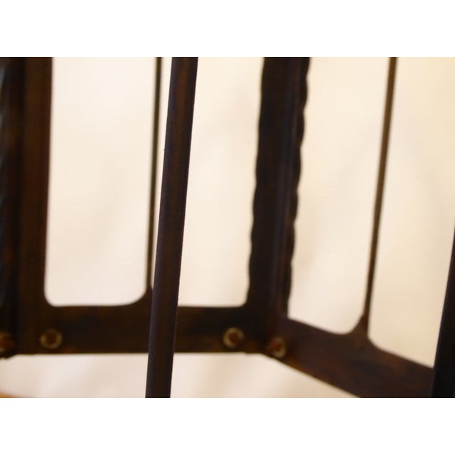 This iron lantern has updated wiring and uses up to 100 Watt Edison base bulb, it is hardwired and in working order. It...