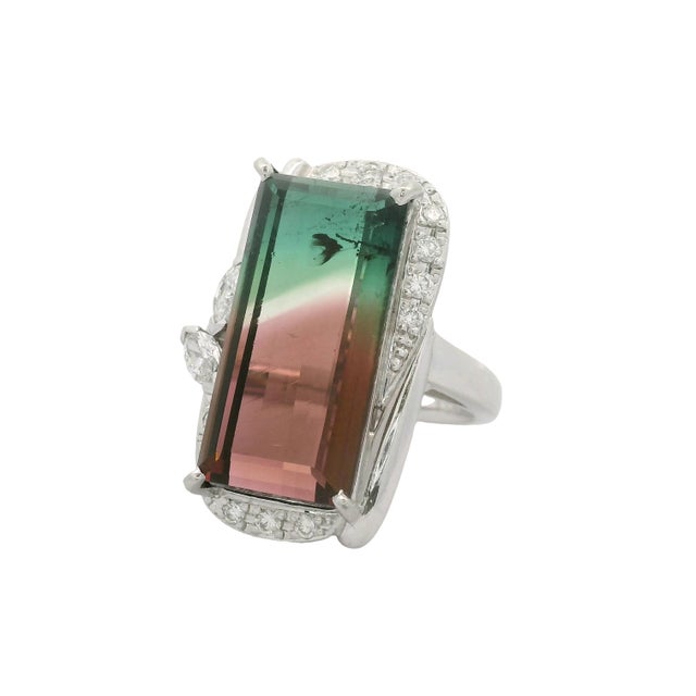 A contemporary fashion ring ready to be worn. This striking piece features a 13.48-carat baguette watermelon tourmaline as...