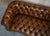 Animal Skin Exceptionally Rare Pair of Fully Restored Antique Howard & Sons Berners Street Leather Chesterfield Sofas For Sale - Image 7 of 18