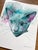 Steely Sweetheart captures the essence of a sleek cat's face, rendered in a delicate interplay of watercolors that blend...