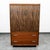 Unique and well made Gentleman's chest in walnut. Comes with 2 drawers below and 2 drawers behind the doors.