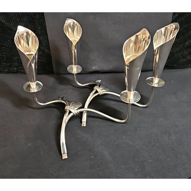 This elegant pair of Mid-Century Modern silver plate Cala Lily candle holders were crafted in Denmark by the esteemed...