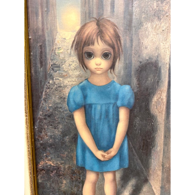 This is a beautiful 1962 print by Margaret Keane capturing the artist’s most iconic subject: a solitary child rendered...