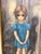 This is a beautiful 1962 print by Margaret Keane capturing the artist’s most iconic subject: a solitary child rendered...