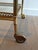 This neoclassical style drinks trolley is made of brass with removable trays. This bar cart is a French work in the style...