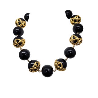 Vintage 1990s Signed Monet Goldtone Black Chunky Beaded Necklace For Sale