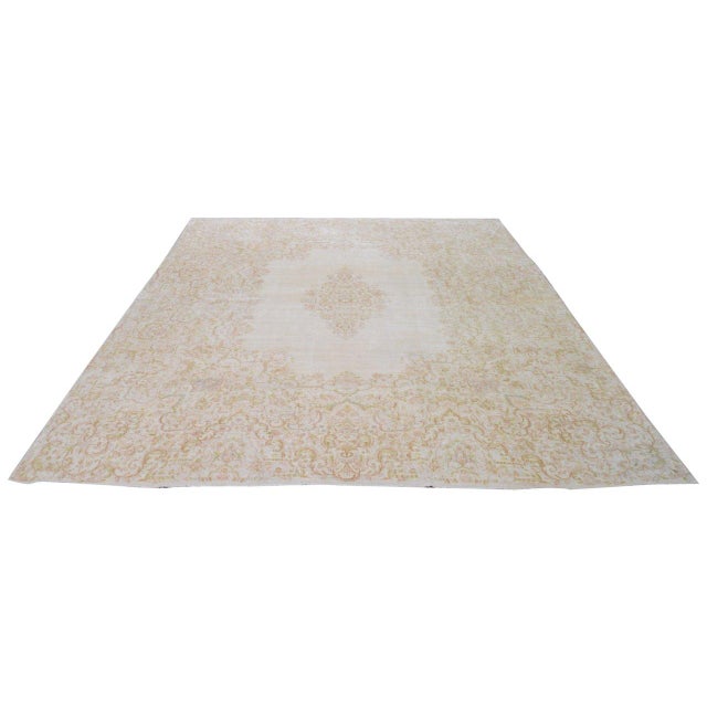 Hand-knotted with care using traditional rug-making techniques, this wool rug blends timeless craftsmanship with a modern...