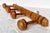 Imported from France. Early 1900s faux bamboo hat/coat rack with four hand turned pegs. Beautiful naturally aged wood...