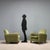 Pair of armchairs with sprung padding, velvet upholstery, wooden legs. This piece is attributed to the mentioned...