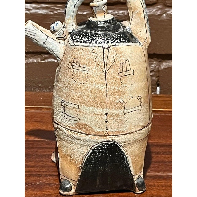 Fine art studio pottery sculpture by Bay Area ceramicist Gerry Wallace. Hand-built using poured porcelain and stoneware...