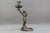 French Art Nouveau style pewter candlestick with a sculpture of a lady, from circa 1920. An elegant Art Nouveau candle...