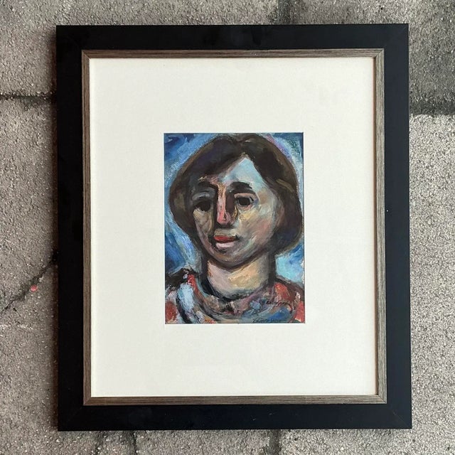 Add a touch of bohemian flair to your space with this Vintage Boho Original Oil On Paper Portrait. Exuding artistic charm...