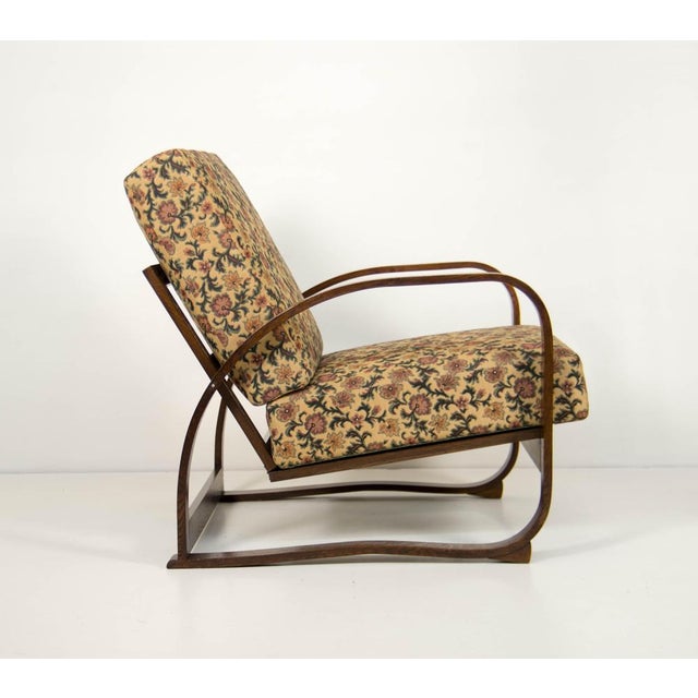 Iconic H-70 armchair designed by renowned Czech modernist Jindřich Halabala for UP Závody, Brno, circa 1930s–1940s. This...