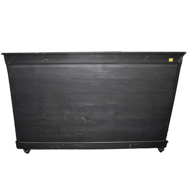 The Antique Victorian English Ebonized Inlaid Credenza with Wedgewood Plack is a stunning piece of furniture from the late...