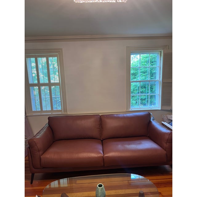 Super comfortable BRAND NEW with TAG leather caramel cognac chestnut colored leather sofa. with padded arms, removable...