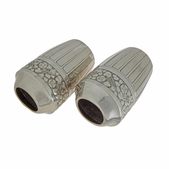 Stylish and hard to find pair of Art Deco WMF silver-plated vases, perfect for collectors and design enthusiasts seeking...