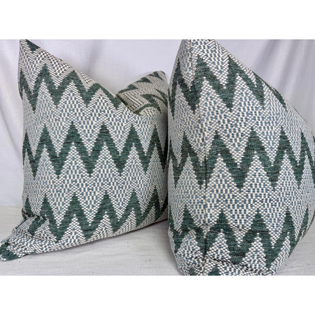Custom pair of 22" pillows covered in Harlequin "Akari" in pine woven fabric. These pillows have tapered corners to...
