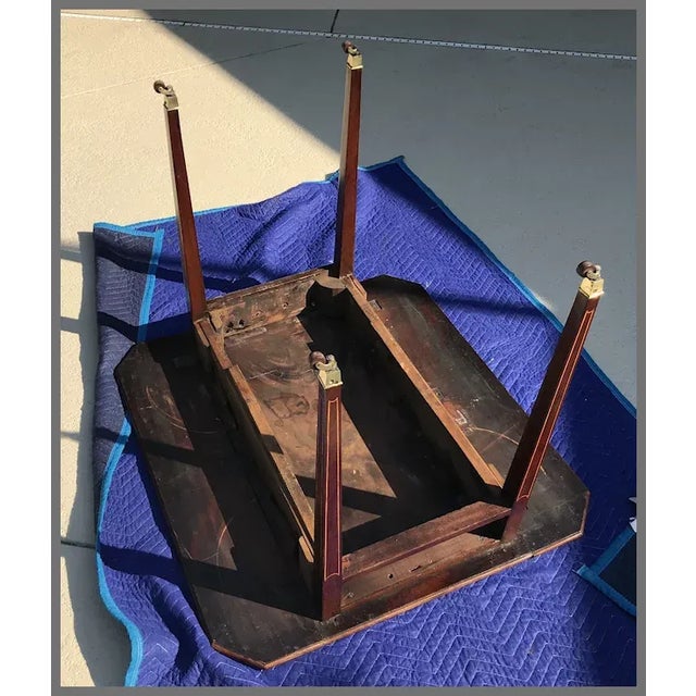 George III period inlaid mahogany pembroke table with drawer. The table is highlighted by a patera oval fan inlay with 19...