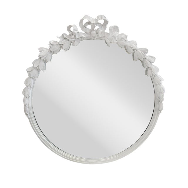 Round early 20th century carved wood and gesso painted mirror.