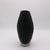 A contemporary Italian Murano Art Glass vase from Italy circa 1990. The hand molded tinted matte black glass with deep...