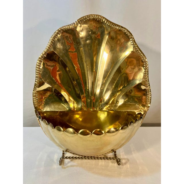 This is a wonderful Solid Brass Hollywood Regency Hand Hammered Shell motif wall pocket /planter. Polished to a high shine...