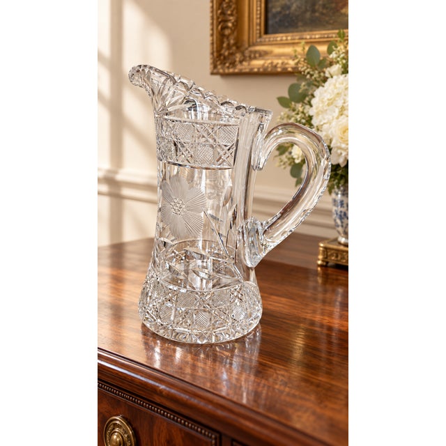 An exceptionally substantial vintage cut lead crystal water pitcher executed in the American Brilliant style. Weighing...