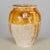A 19th century French earthenware pot à confit with traditional yellow ochre glaze. Rustic condition with chips and...