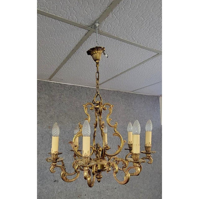 Large Louis XV style gilt bronze chandelier, circa 1950 8 light arms in total beautifully chased decoration swirling arms...