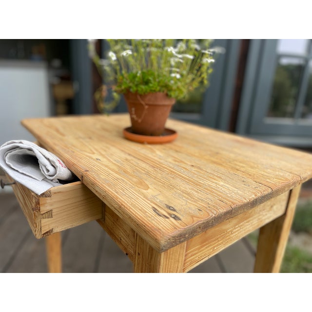 This charming antique side table has been sanded and oiled by us. The table is meant to show its age. It has many...