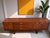 A stunning and exceptionally rare Danish-style teak sideboard dating from the 1960s. Measuring an impressive 250 cm in...