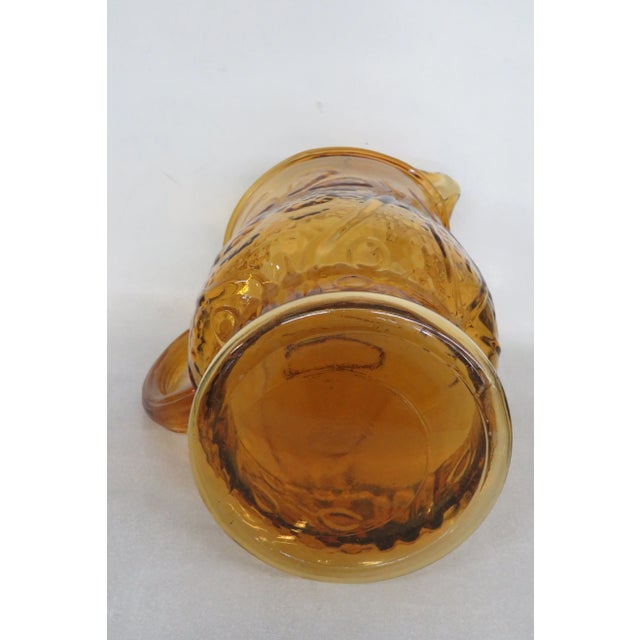 This magnificent Pitcher is made out of glass, and is in good condition. This fantastic Pitcher has incredible style:...