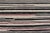 Measures: 9'9 x 12'8. This modern casual tribal rug has been hand-knotted. The rug features a modern sub-geometric...