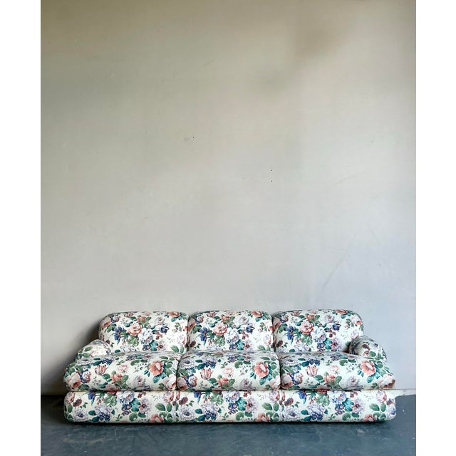 This expansive vintage sofa is a masterful example of the "English Country House" or "Grandmillennial" aesthetic that...