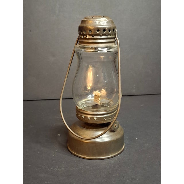 This is an authentic, original antique Victorian/Edwardian brass miniature "Skater's" lantern dating to circa 1895–1910....