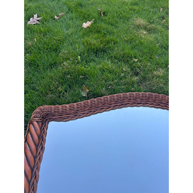 Wicker/Rattan Arched Wall Mirror with an arched top. Warm brown inviting finish. Henry Link Style