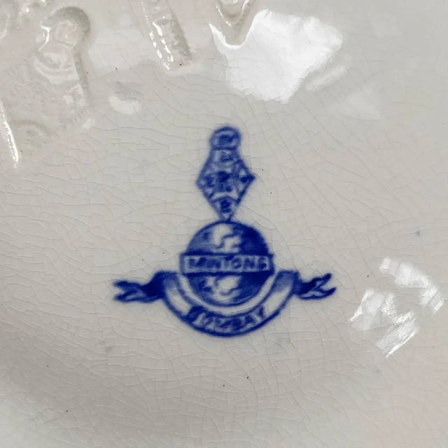 A Victorian Minton flow blue porcelain oyster plate, with six oyster wells, a center well and a large well for crackers....