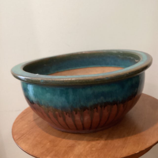 This Vintage Large and Heavy Copper Green with Drip Glaze Ceramic Low Bowl Planter is a unique and decorative collectible...