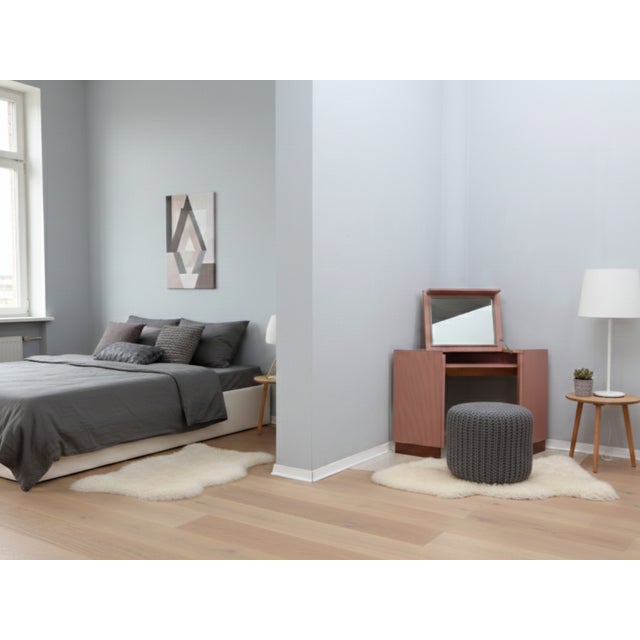 Stylish and original petineuse vintage design attributed to Ettore Sottsass and produced in Italy during 1960s. It is made...