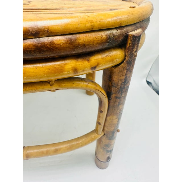 Charming footstool made of rattan. Perfect organic addition to any style of decor