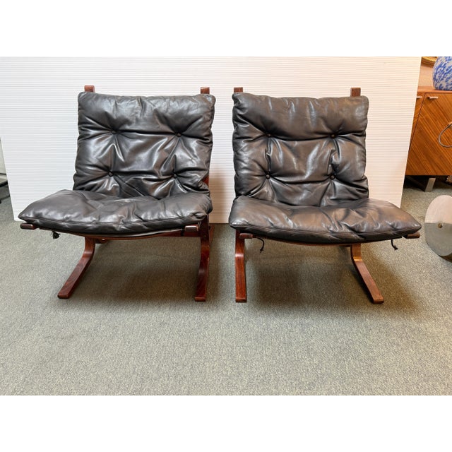 Design Plus Gallery presents a Pair of Siesta Lounge Chairs by Ingmar Relling for Westnofa. = These Siesta Classic Chairs...