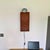 Wall sculpture lamp featuring a 1987 vintage chair back and a Republic-era porcelain bowl (1920s–1940s). A deliberate...