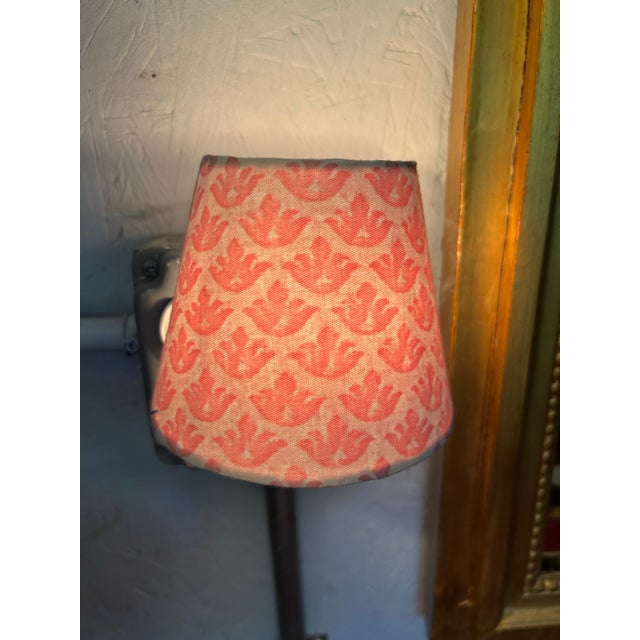 A plug in nightlight handmade with iconic Fortuny fabric, bulb included