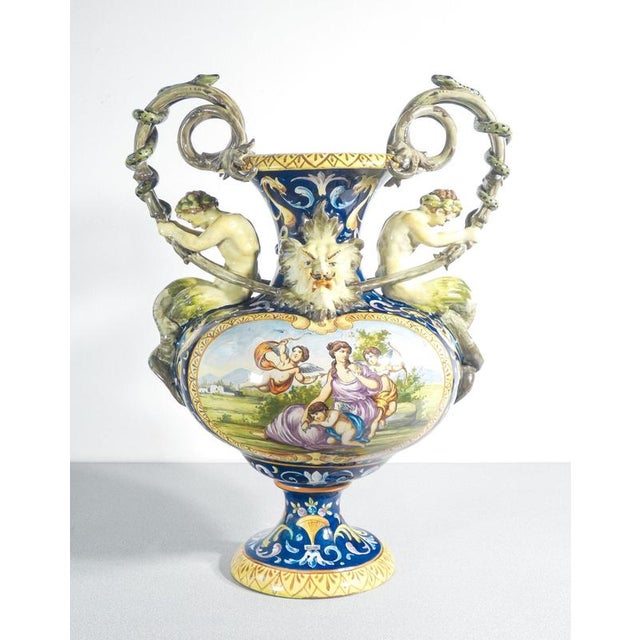 Triptych of large, richly carved and painted ceramic vases, richard ginori. Italy, early 20th century origin italy period...
