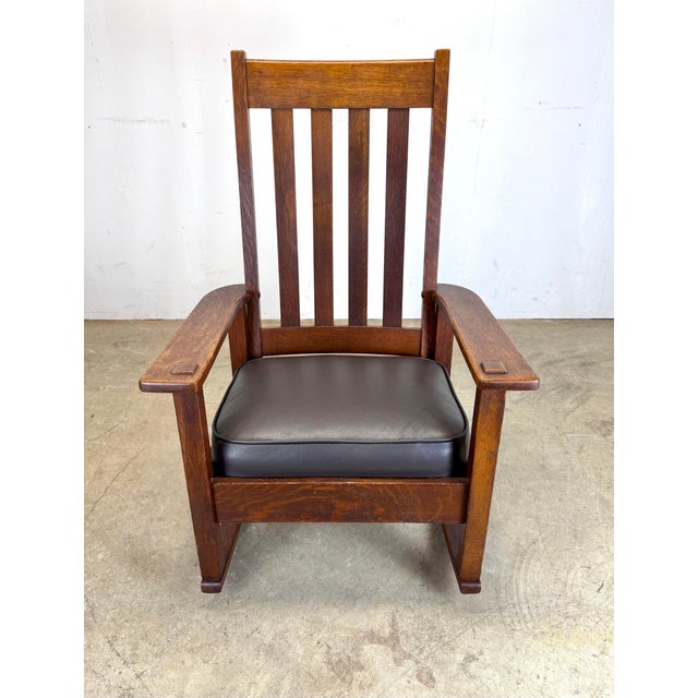 A fabulous quarter-sawn oak arts & crafts rocking chair by Stickley Brothers, Grand Rapids circa 1900-1920. Signed. Has...