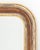 LaBarge Silvered and Giltwood Framed Beveled Glass Mirror, arch form with gilded beaded borders, label and marked "Made in...