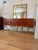 Long Red Stained Cabinet with Sculptural Bold Base This is a great statement console for those who love color and making a...