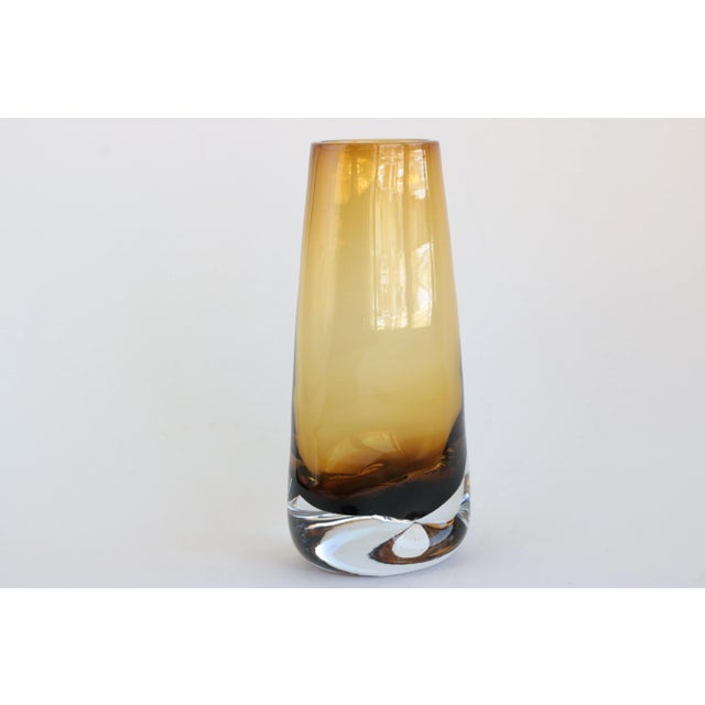 This mid-century modern vase has a sleek tapered form with pinched sides. Great for floral arrangement, but equally...