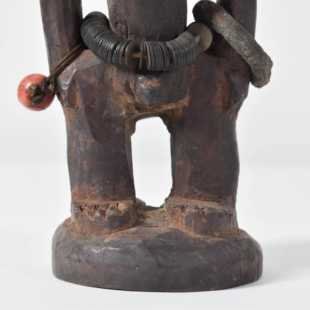 Ibeji figures, carved by the Yoruba people of Nigeria, are wooden twin sculptures holding cultural significance in Yoruba...