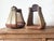 Add texture and warmth to your western decor with this large pair of vintage roping saddle stirrups. These stirrups are...